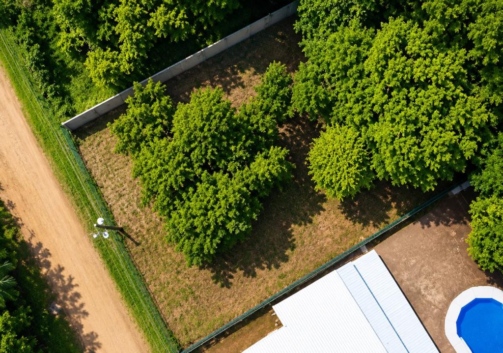 Aerial view of flat walk-to-beach Playa Potrero lot for sale in Surfside Costa Rica