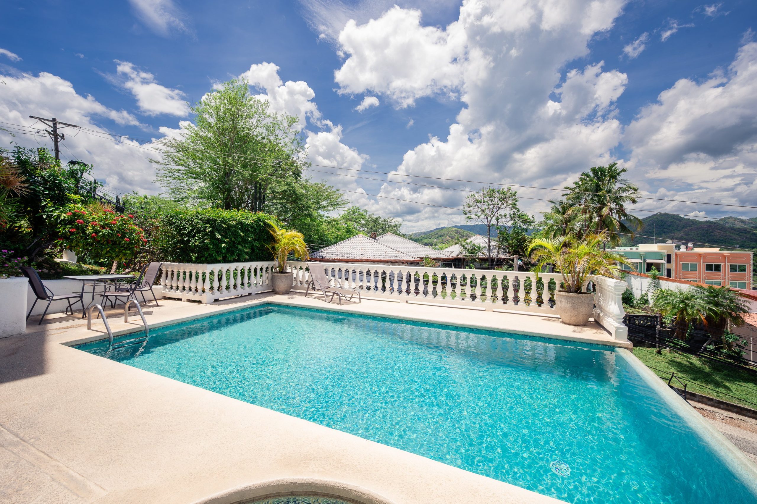 Swimming pool with mountain views at Flamingo Marina Real