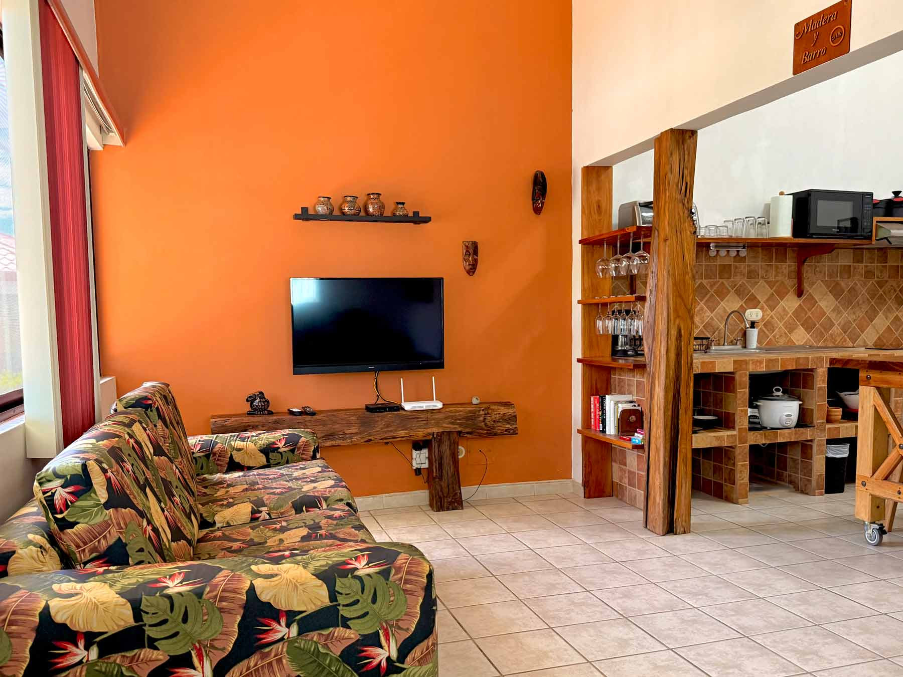 Open living room and kitchen in Turquoise El Coco condo in Playas del Coco, Costa Rica