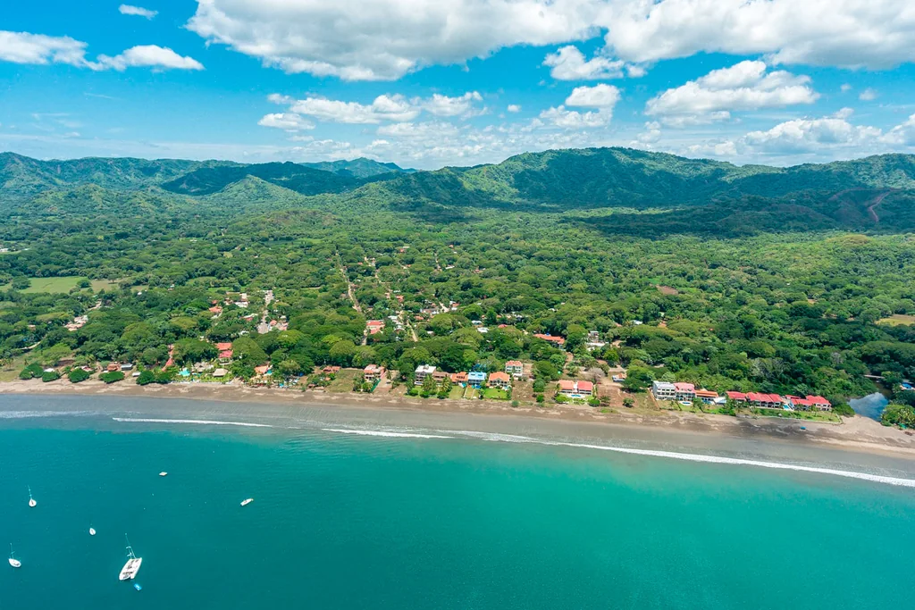 Aerial view of Playa Potrero beach town and bay on Costa Rica's Guanacaste Gold Coast