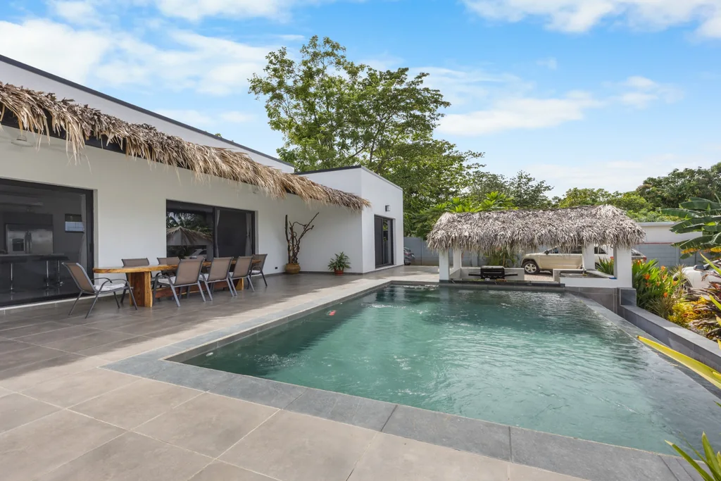 Single-story home with pool, thatched ranchito and dining terrace in Playa Potrero, Costa Rica