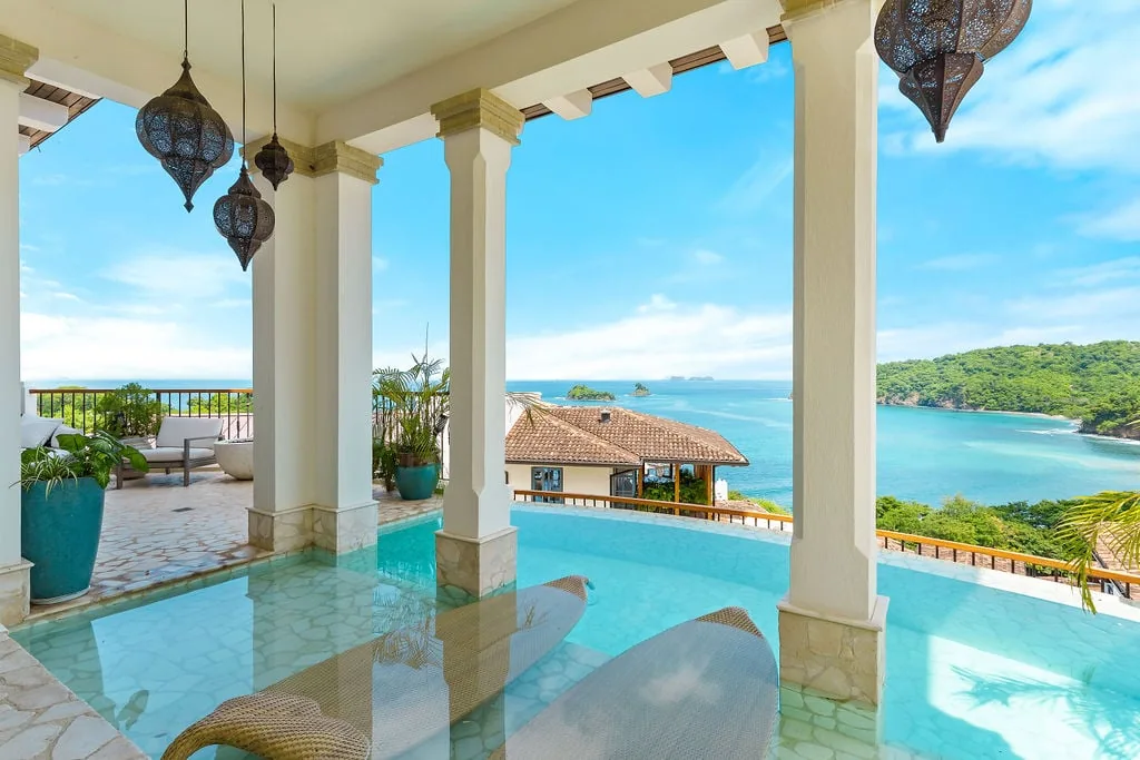 Luxury villa terrace with infinity pool and ocean-and-island views on Costa Rica's Guanacaste Gold Coast