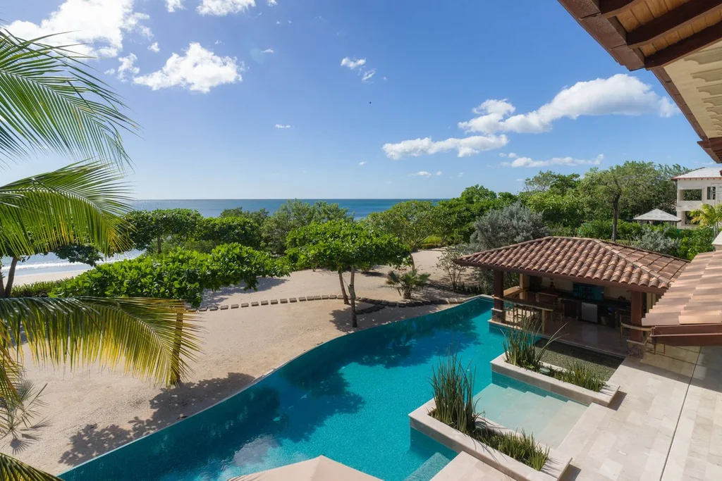 Beachfront estate with pool and palapa steps from the sand in Guanacaste, Costa Rica