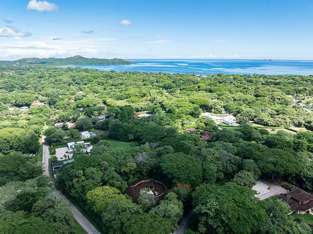 Aerial view over Catalina Cove and the surrounding forest to the Brasilito coastline and bay, Guanacaste, Costa Rica.