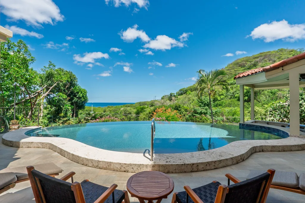 Infinity pool and covered terrace with ocean views at an exclusive Guanacaste property, Costa Rica