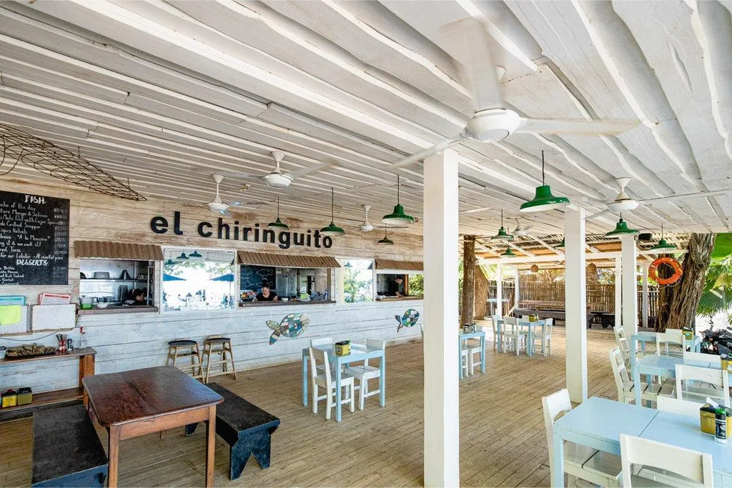 Beachfront dining at El Chiringuito on Playa Tamarindo, Costa Rica