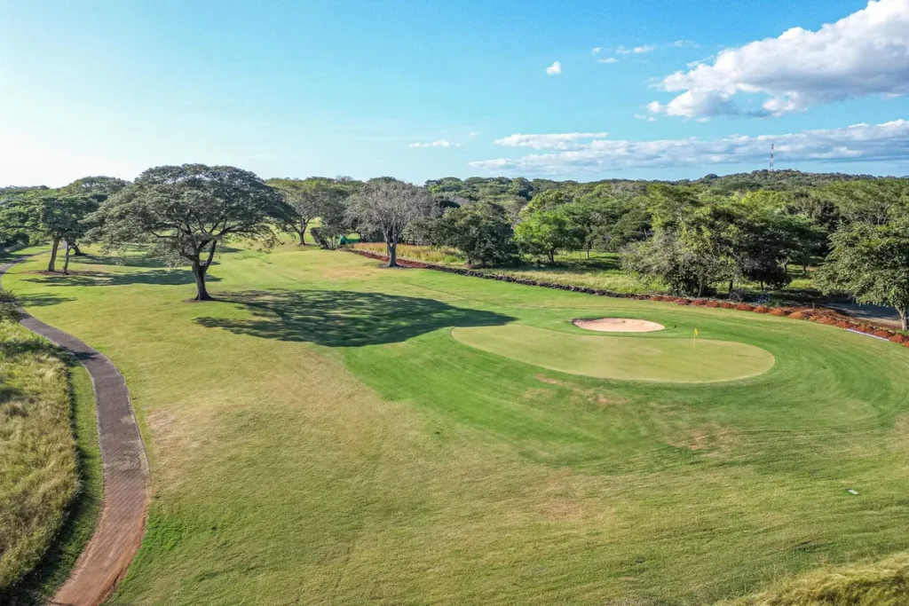 Golf green and fairway on the championship course at Hacienda Pinilla, Guanacaste, Costa Rica