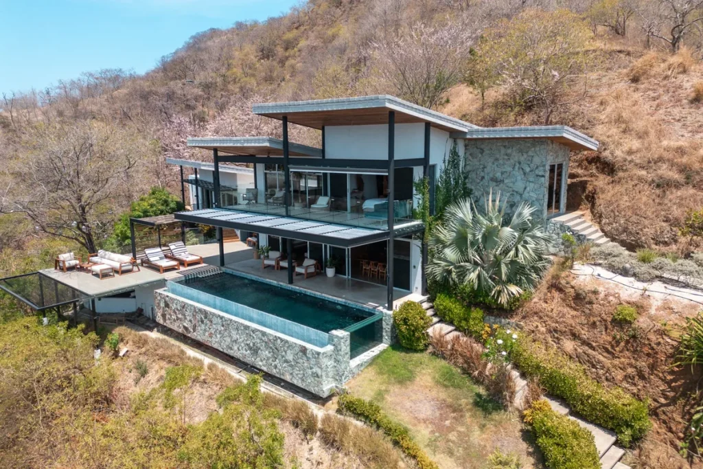 Modern hillside home in Las Ventanas with an infinity pool and covered terraces, near Playa Grande, Costa Rica