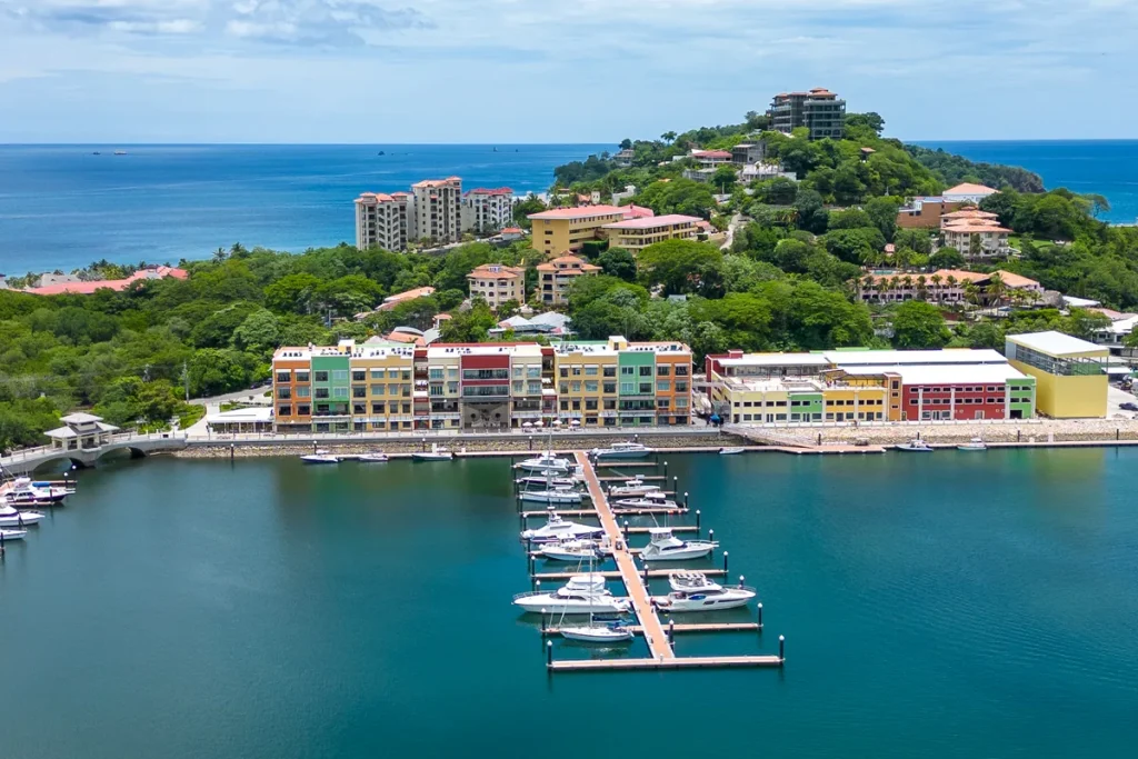 Flamingo Marina village with boats at the docks and hillside homes above, Playa Flamingo, Guanacaste, Costa Rica